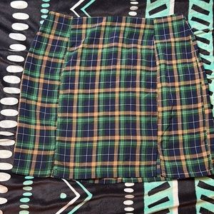 From SHEIN it’s a large skirt it’s navy blue and green burnt orange
